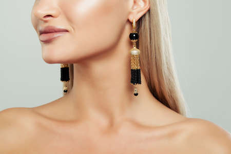 Gold Female Earrings with Pearl, Closeup Portraitの写真素材