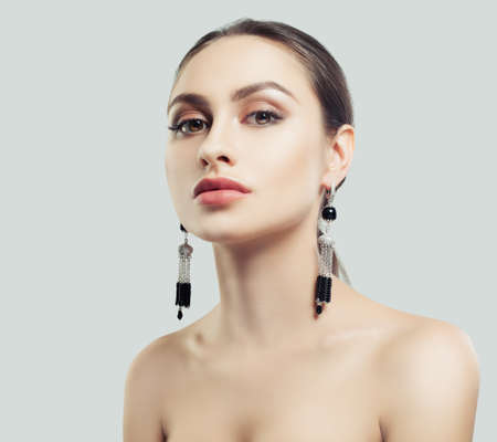 Glamorous Fashion Model Woman with Makeup and Jewelry Earringsの写真素材