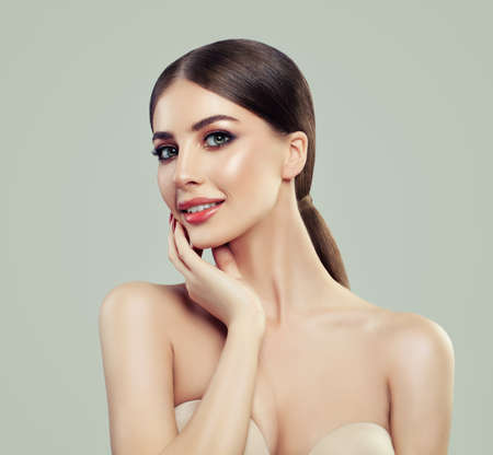 Cute Smiling Woman Spa Model with Healthy Skin and Straight Hair. Facial Treatment, Cosmetology, Beauty, Skin Care and Spaの写真素材