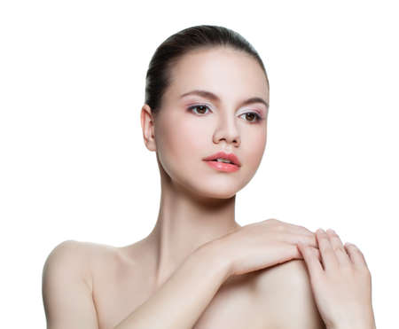 Woman isolated on white. Beautiful young female model girl, natural beauty, skincare and medicine conceptの写真素材