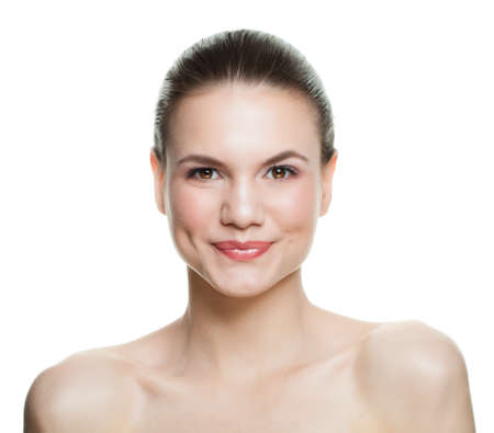Smiling woman isolated on white background. Beautiful young woman with healthy skin laughingの写真素材