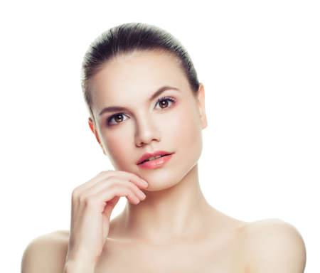 Attractive woman isolated on white background. Healthy skin, natural nude makeupの写真素材