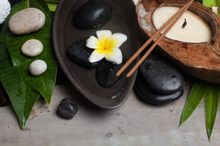 spa wellness tropical objects for therapy on wooden background.