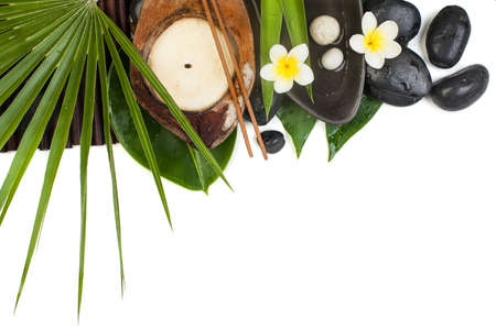 spa tropical leaves and flowers for aroma healthy therapy on white background.の写真素材
