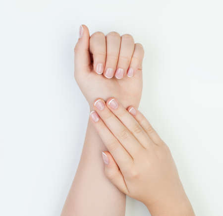 Manicure concept on white background. Female handの写真素材