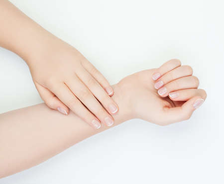 female hands with Beautiful  nails on white background. Manicure conceptの写真素材