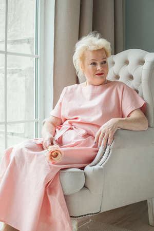 Beautiful older woman resting at homeの写真素材
