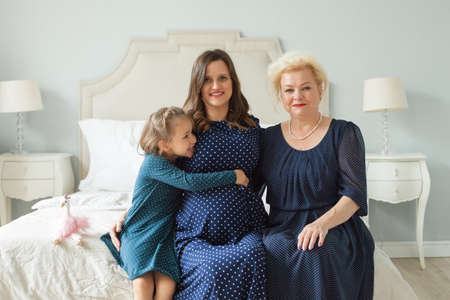 Grandmother with adult daughter and little granddaughter. Happy familyの写真素材