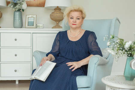 Senior woman at home, 60sの写真素材