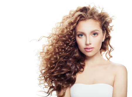 Isolated spa woman with healthy skin and perfect wavy hairstyle. Spa beauty, cosmetology, facial treatment and wellness conceptの写真素材
