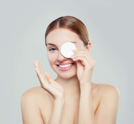 Young happy woman with clean cotton pads.の写真素材