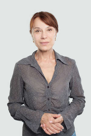 Mature woman on whiteの写真素材