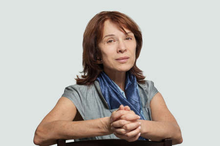 Woman mature on white, portraitの写真素材