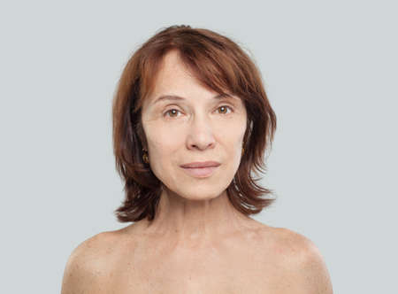 Mature woman on white.の写真素材
