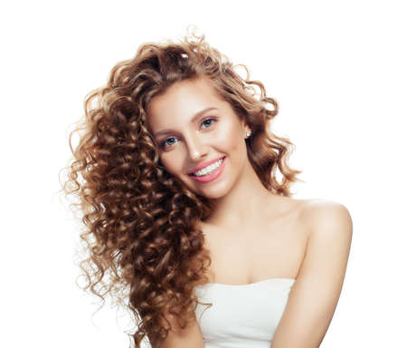 Pretty woman with curly haircut isolated on white. Positive emotionの写真素材