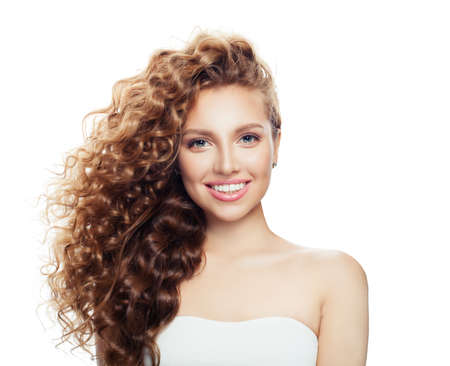 Beauty portrait of happy young woman isolated on whiteの写真素材