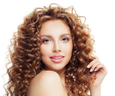 Perfect blonde woman with healthy curly hair isolated on whiteの写真素材
