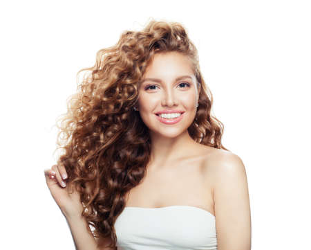 Beautiful young woman with blonde hair isolated on whiteの写真素材