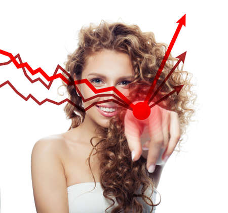 Cheerful woman pointing on red rising arrowの写真素材