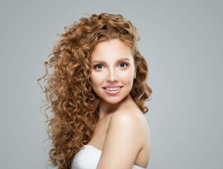 Cheerful woman face. Cute girl smilingの写真素材