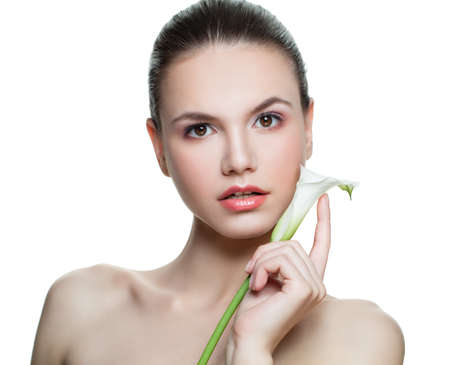 Cute woman with flower isolated on whiteの写真素材