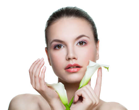 Spa beauty girl showing empty copy space on the open hand isolated on white.の写真素材