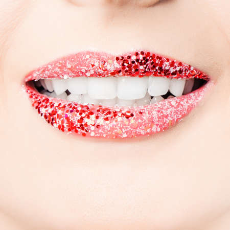 Sexy female lips with makeup and white teethの写真素材