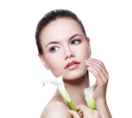 Young perfect woman with healthy fresh skin isolated on white. Facial treatment, cosmetology, beauty, skincare and spa conceptの写真素材