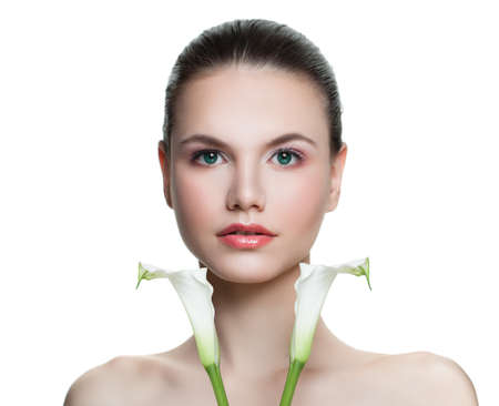 Young woman holding two calla lily flower isolated on white backgroundの写真素材