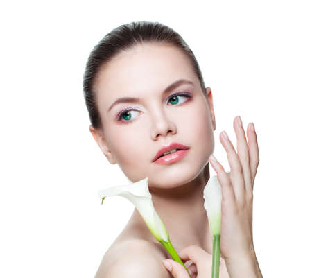 Healthy woman isolated on white background, spa face closeupの写真素材