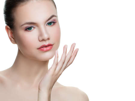 Young pretty woman isolated on white background. Facial treatment, cosmetology, beauty, skincare and spa conceptの写真素材