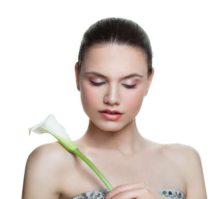 Fashion model woman with flower isolated on white backgroundの写真素材