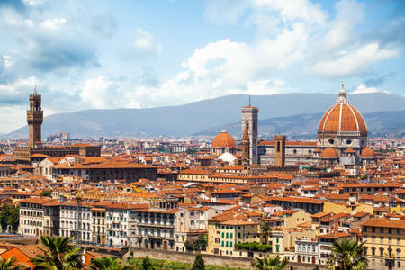 Landscape of Florence in Italy with the ancient tower of Old Palace Palazzo Vecchio, Florence Duomo, Basilica di Santa Maria del Fiore.の写真素材