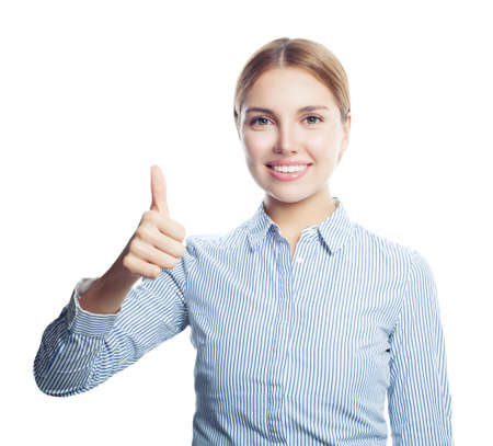Happy smiling woman showing thumb up isolated on whiteの写真素材