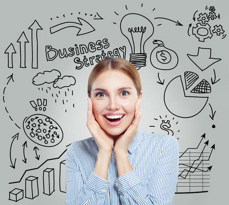 Smiling businesswoman with infographics and lightbulb. Business strategy and start up conceptの写真素材
