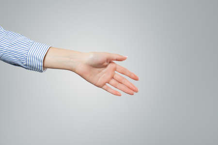 Handshake woman. Shaking female hand only. の写真素材