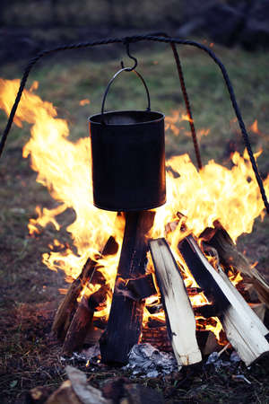 tourist's bowler campfire. A Pot Of Food On The Fire