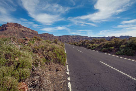Road  in Mountain on Canary Islands Tenerife. Landscape with road, mountain and skyの写真素材
