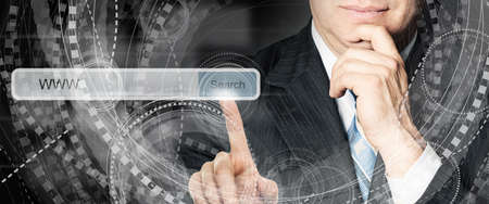 Business man pointing to empty address bar in virtual web browser. Seo, internet marketing and advertising marketing conceptの写真素材