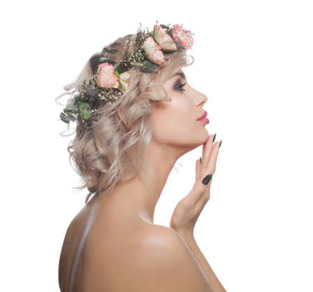 Model woman wearing flowers crown isolated on white. Beautiful female face, profile