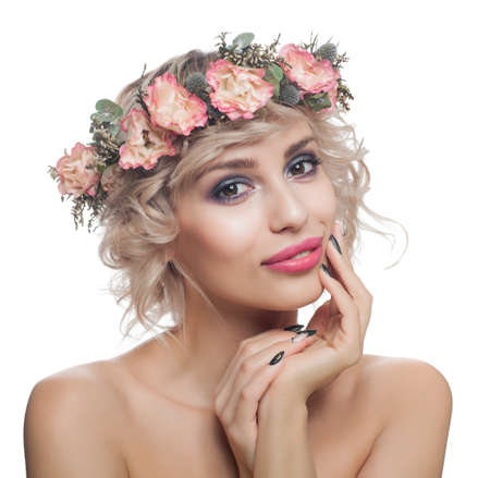 Pretty Model with Short Haircut, Makeup, Manicured Nails and Flowers Crown Isolated on Whiteの写真素材