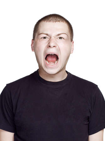 Portrait of young man. Facial expression. Scream face.の写真素材