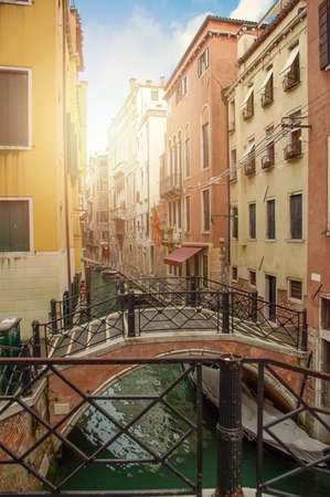 brige through canal waters of Venice Italyの写真素材