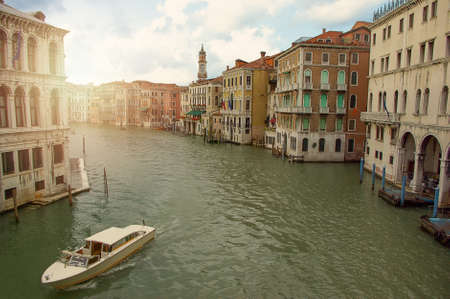 Boats in big canal waters of Venice Italy. Street in water cityの写真素材