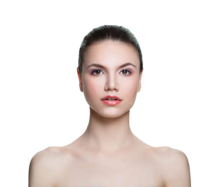 Young woman with healthy clear skin isolated on white. Skincare and facial treatment conceptの写真素材