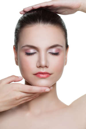 Perfect woman with clear skin on white. Beautiful faceの写真素材