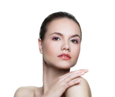 Portrait of attractive young woman with clear skin isolated on whiteの写真素材