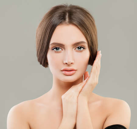 Beautiful model woman with clear skin, skincare and facial treatment conceptの写真素材