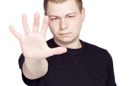 man shows the hands stop on white backgroundの写真素材