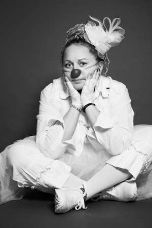 Studio portrait of actress woman clown, black and white photoの写真素材